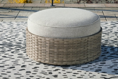 Ashley Signature Design Calworth Outdoor Ottoman with Cushion Beige P458-814