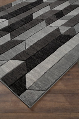 Ashley Signature Design Chayse 6'6" x 9'6" Rug Black/Gray R403461